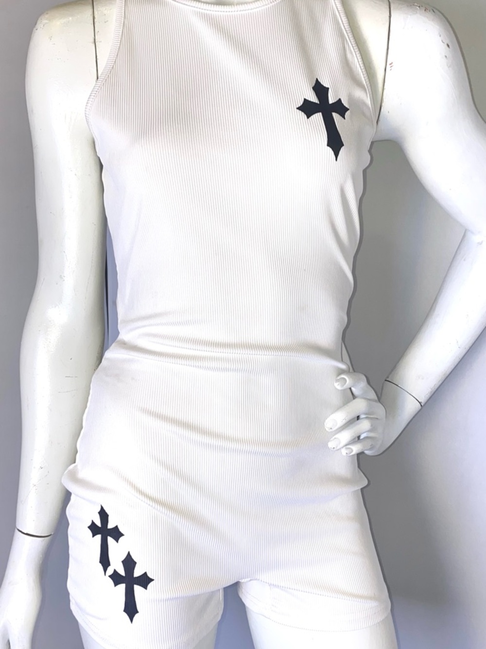 White Ribbed Romper with Black Cross Motifs